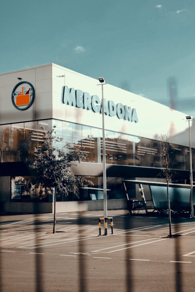 Stylish view of a modern Mercadona supermarket building exterior in daylight.